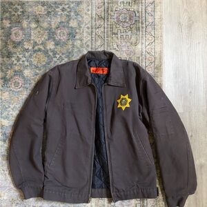 Vintage Men's Brown Quilted Jacket with Yellow Badge